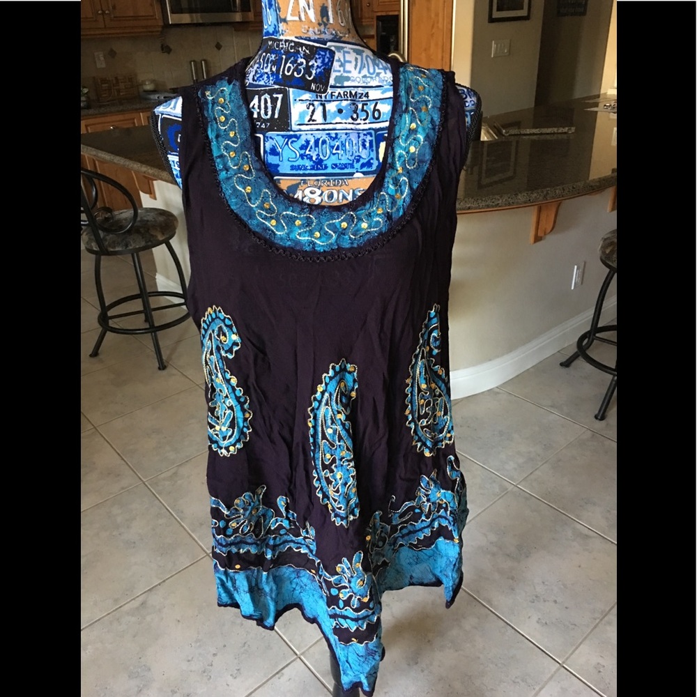 Blue tank with design work